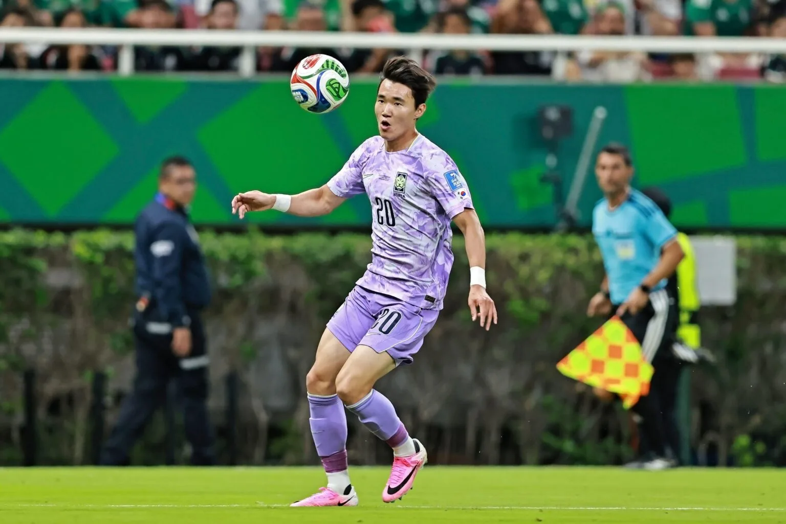 Yang Hyun-jun in South Korea's purple away kit